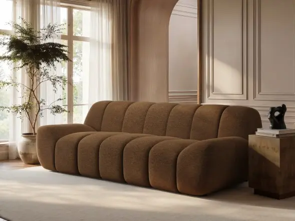 Macy large 3 seater sofa in cream textured fabric with sculpted panel design in a modern living room
