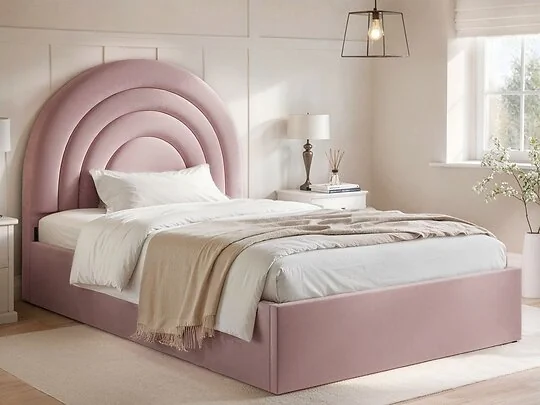 Flair Ava small double ottoman bed in pink velvet with arched rainbow headboard in a bedroom