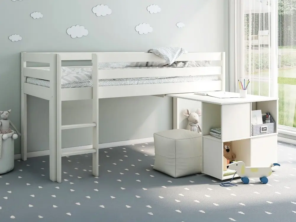 Noomi Nora white mid sleeper bed with pull-out desk in a child’s bedroom 
