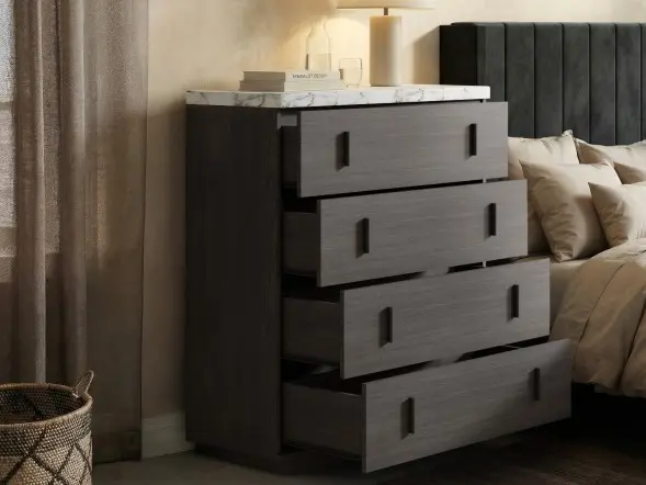 Walnut chest of drawers with marble effect top. 