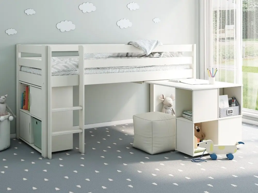 Noomi Nora Craft white mid sleeper with desk and storage in a child’s bedroom 
