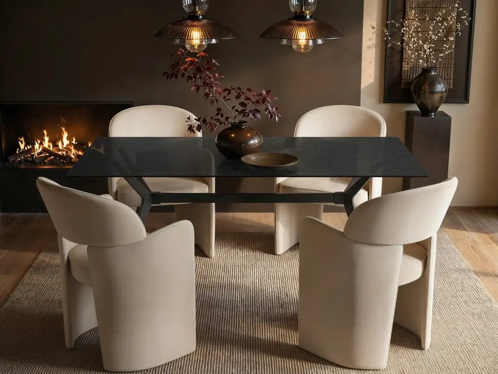 Emil rectangular black mottled glass dining table with four beige Estella velvet chairs 

